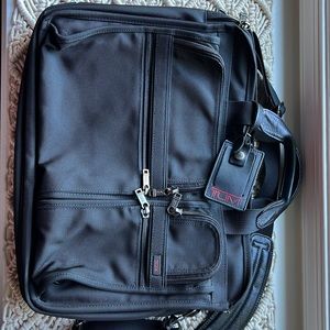 Tumi expandable travel laptop briefcase / messenger